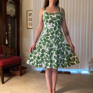 Sleeveless fit and flare in Size 2, wash and wear.